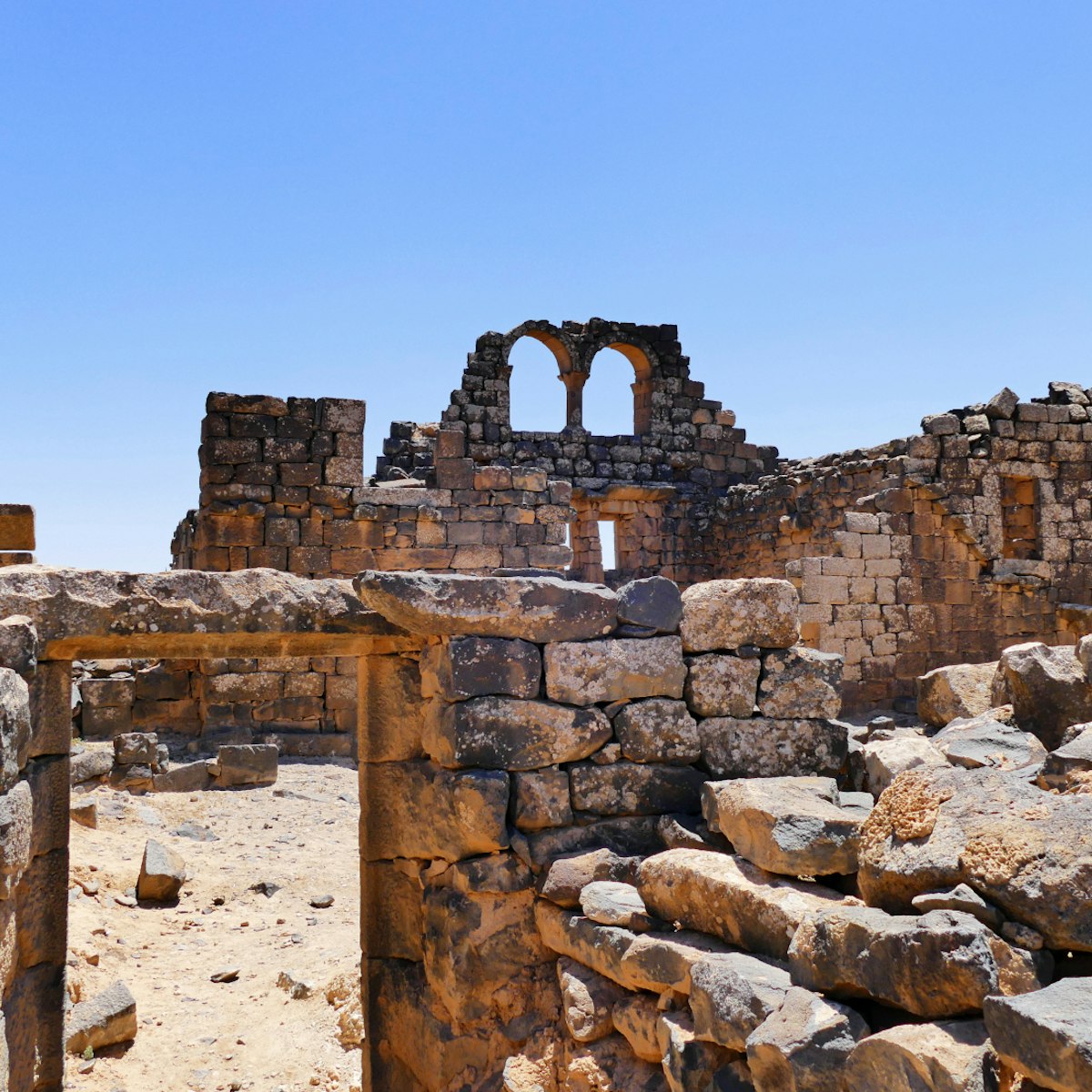 Scenic View Ancient Byzantine and Early Islamic Town Ruins of Umm el-Jimal in Northern Jordan; Shutterstock ID 555164446; Your name (First / Last): Lauren Keith; GL account no.: 65050; Netsuite department name: Content Asset; Full Product or Project name including edition: Jordan 2017