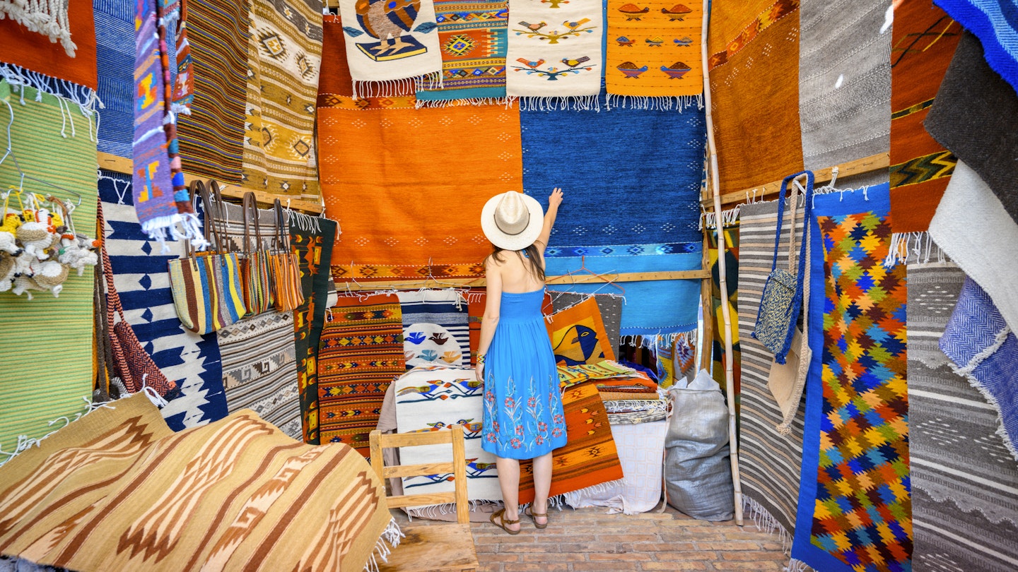 1209650668
#1209650668
Woman admiring the handmade rugs in Oaxaca valley, Mexico - stock photo
Teotitlan Del Valle, Oaxaca, Mexico