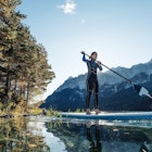 Junge Frau paddelt am SUP Board in der Morgensonne über den Eibsee, Blick zur Zugspitze, Garmisch-Partenkirchen, Bayern, Deutschland. * Young woman stand-up-paddling on Lake Eibsee in the morning light, overlooking the Zugspitze Mountain, Garmisch-Partenkirchen, Bavaria, Germany.
1308858076
RFC, adults, alps, caucasian, leisure, millennials, sunshine, vacation, woman, zugspitze, 20-30 years, stand up paddle surfing, travel destination, young adults, Boat, Canoe, Canoeing, Nature, Oars, Outdoors, Paddle, Person, Photography, Rowboat, Vehicle, Water, Water Sports
Germany, Bavaria, Garmisch Partenkirchen, Young woman stand up paddling on Lake Eibsee