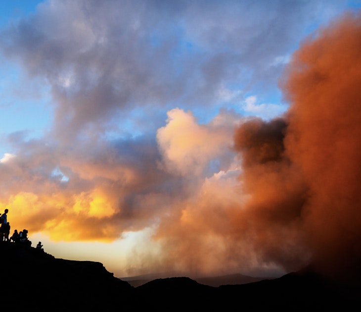 Mt Yasur Volcano, Tanna, Vanuatu
528077207
Tourists watching Mt Yasur volcano. Tanna, Vanuatu - stock photo
Silhouettes of tourists watching eruptions in the crater of the active Mt Yasur Volcano on Tanna Island, Tafea, Vanuatu. This volcano is continually active at a low to moderate level. Tourists may approach the rim to view the crater eruptions when the activity level is not dangerously high.