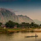 Boat moves along Nam Xong River in Vang Vieng
465847819
Distant; Incidental People; On The Move; One Person; Outdoors; Sky; Vang Viang; Horizontal; Nature; Nautical Vessel; River; Tree; Twilight; Laos; People; Photography; Color Image; Mountain; Mountain Range; Nam Xong River; Reflection; Transportation;