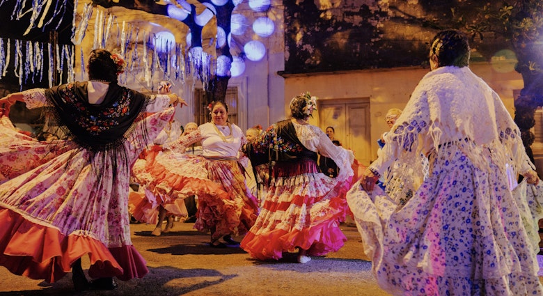 ASUNCION, PARAGUAY, AUGUST, 2024. Traditional Paraguayan dancers known as "galoperas" perform at a musical and cultural event in the historic La Chacarita neighborhood in Asunción, Paraguay. María Magdalena Arréllaga for Lonely Planet.Adult, Bride, Clothing, Dance Pose, Dancing, Female, Footwear, Leisure Activities, People, Person, Shoe, Wedding, Woman.ASUNCION, PARAGUAY, AUGUST, 2024. Traditional Paraguayan dancers known as "galoperas" perform at a musical and cultural event in the historic La Chacarita
Adult, Bride, Clothing, Dancing, Female, Footwear, People, Person, Shoe, Wedding, Woman, Dance Pose, Leisure Activities, Adult, Bride, Dancing, Female, People, Person, Woman
ASUNCION, PARAGUAY, AUGUST, 2024. Traditional Paraguayan dancers known as "galoperas" perform at a musical and cultural event in the historic La Chacarita neighborhood in Asunción, Paraguay. María Magdalena Arréllaga for Lonely Planet