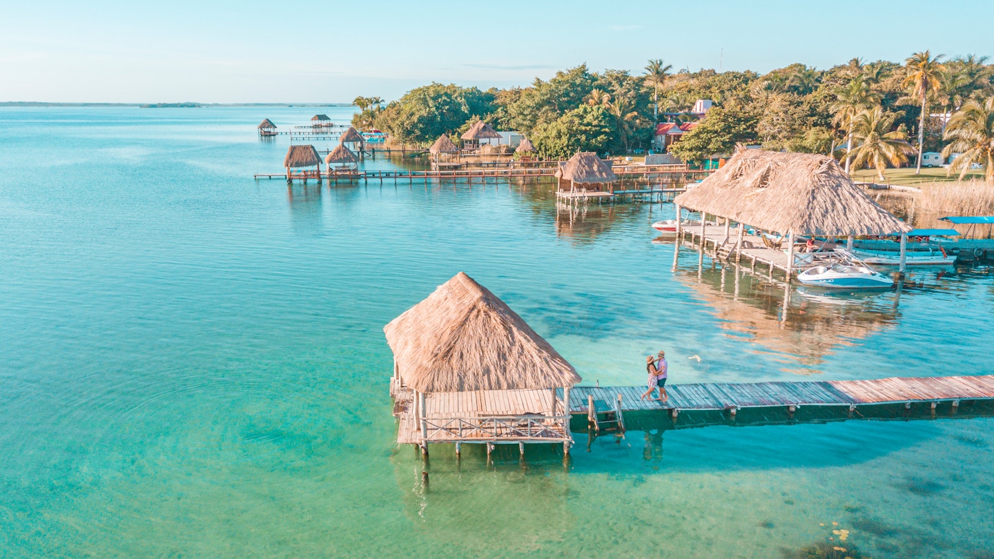 Aerial view of a Couple in Bacalar pier, Riviera Maya, Mexico License Type: media Download Time: 2023-06-15T03:53:23.000Z User: Is Editorial: No purchase_order: 56530/Global Publishing-WIP