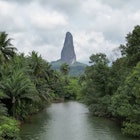 View from Rio Caué at South of São Tomé e Principe with thw Peek Cão Grande as backgroumd,Africa; Shutterstock ID 2413453015; purchase_order: 65050; job: Lonely Planet Online Editorial; client: Sao Tome & Principe FT guide; other: Brian Healy
2413453015
africa, african, beautiful, biosphere, blue, cao, caue, cauÈ, country, countryside, dog, environment, forest, grass, green, greenery, gulf of guinea, hiking, island, jungle, land, landscape, mountain, mountain landscape, national park, natural, nature, outdoor, palm, peak, pico cao, pico cao grande, portuguese, principe, river, sao tome, sao tome and principe, scene, scenery, scenic, sky, tourism, travel, tree, trees, tropical, vacation, view, water, west africa
View from Rio Caué at South of São Tomé e Principe with the Peak Cão Grande as background, Africa