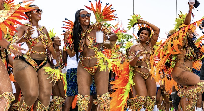 PORT OF SPAIN, TRINIDAD - February 13: Masqueraders enjoy themselves in the Tribe Carnival presentation-Rainforest-, February 13, 2024 on the streets of Port of Spain, Trinidad.; Shutterstock ID 2425056851; purchase_order: 65050; job: Lonely Planet Online Editorial; client: First-time guide to Trinidad; other: Brian Healy
2425056851
art, attraction, bacchanal, beauty, body, bright, calypso, caribbean, carnival, carnivale, celebration, colorful, colour, costume, culture, dance, dancer, decoration, design, disguise, editorial, exotic, face, fantasy, fashion, feather, festival, fun, gay, glamour, happy, head shot, holiday, makeup, mardi gras, mas, masquerade, ornate, parade, party, port of spain, pretty, sexy, smile, soca, summer, tobago, trinidad, trinidad and tobago, trinidad carnival
PORT OF SPAIN, TRINIDAD - February 13: Masqueraders enjoy themselves in the Tribe Carnival presentation-Rainforest-, February 13, 2024 on the streets of Port of Spain, Trinidad