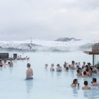 Blue lagoon, Iceland - February 20, 2016: People in SPA are drinking cocktails near a cafe in the swiming pool, Blue lagoon - a geothermal bath resort in the south of Iceland, in winter.
amazing, bath, bathing, blue, cafe, care, cocktail, documentary, editorial, geology, geothermal, girl, happy, health, holiday, hot, iceland, icelandic, lagoon, lake, lava, lifestyle, minerals, mud, nordic, people, pool, recreation, relaxing, resort, sightseeing, skin, skincare, spa, spring, therapy, thermal, tourism, tourist, travel, treatment, vacation, volcanic, volcanism, volcano, warm, water, wellness, winter, woman