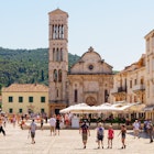 July 10, 2011: Pedestrians at the Main Square in front of the Roman Catholic cathedral of St. Stephen.
775175620
people, tower, historical, adriatic, church, mediterranean, medieval, landmark, stone, tourism, historic, building, square, town, europe, old, city, architecture, adriatic coast, baroque, bell tower, cathedral, coast, croatia, dalmatia, dalmatian renaissance, hvar, main square, rectangular, roman catholic, st. stephen, summer, trg sv stjepana