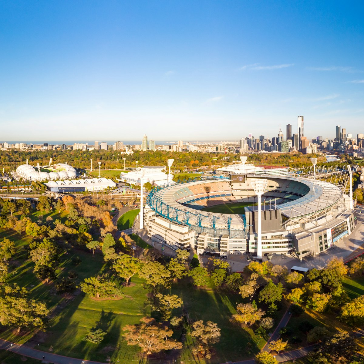 MELBOURNE, AUSTRALIA - MAY 30: Melbourne's famous skyline with Melbourne Cricket Ground stadium in the foreground on a cool autumn morning in Melbourne, Victoria, Australia on May 30th 2018.