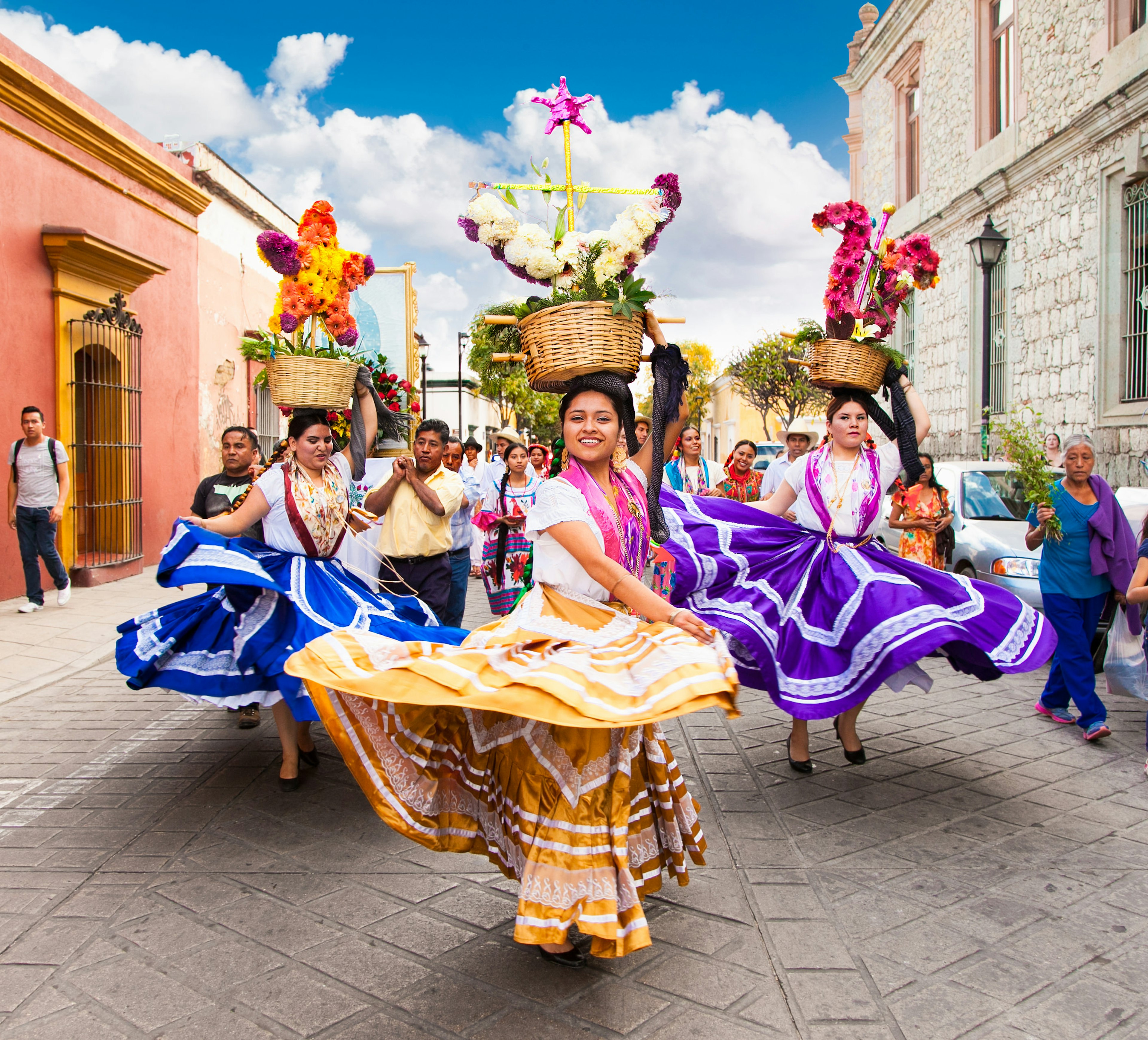 Street celebrations like Day of the Virgin of Guadalupe can be watched for free in Oaxaca